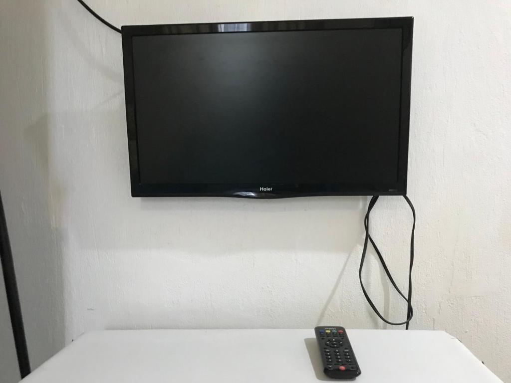 TV a/nebo společenská místnost v ubytování Gerty's Tourist Inn powered by Cocotel