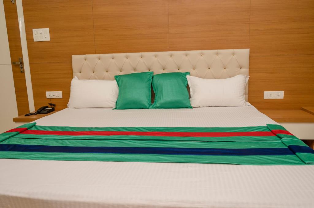 Postel nebo postele na pokoji v ubytování Hotel Green Apple