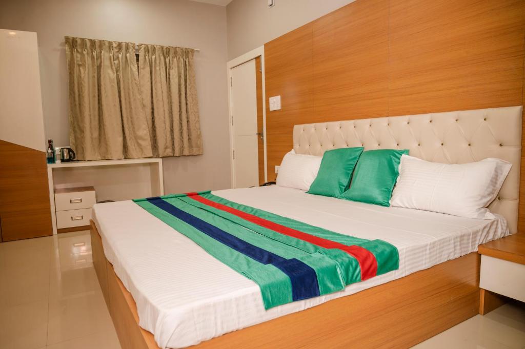 Postel nebo postele na pokoji v ubytování Hotel Green Apple