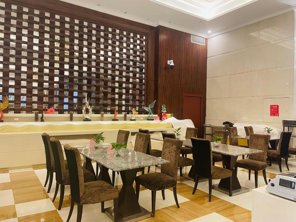 Restaurace v ubytování Shenzhen Shuidu Holiday Hotel, North Railway Station