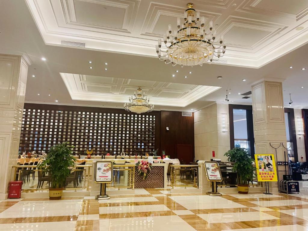 Restaurace v ubytování Shenzhen Shuidu Holiday Hotel, North Railway Station