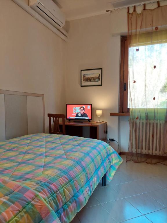 Postel nebo postele na pokoji v ubytování Hotel La Passeggiata
