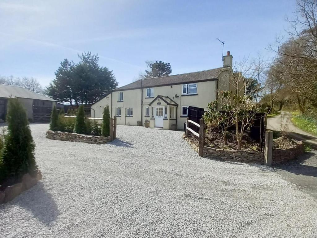 a house with a driveway in front of it at Heath Hills in Okehampton