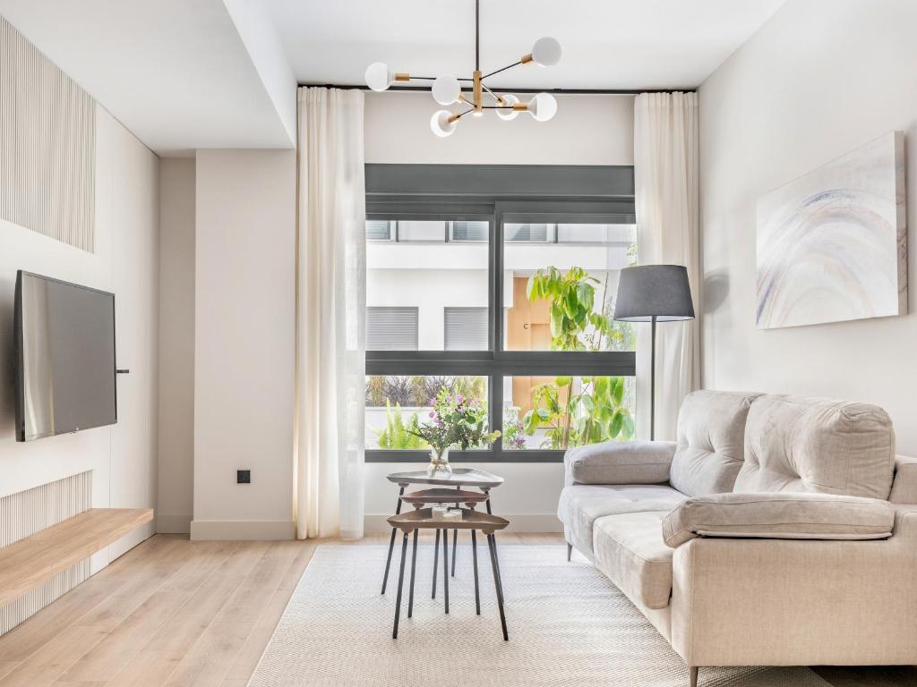 Posezení v ubytování Modern with swimming pool- 2Bd 2Bth- Triana