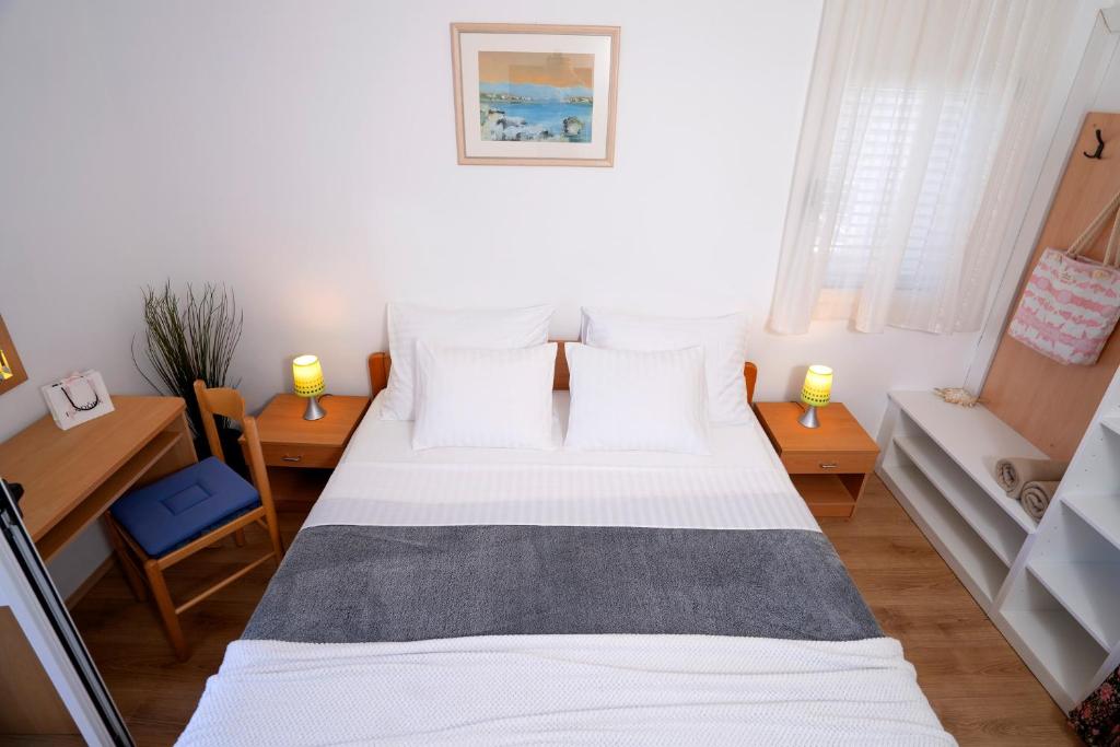 Postel nebo postele na pokoji v ubytování Novak Guesthouse - ZF Hvar