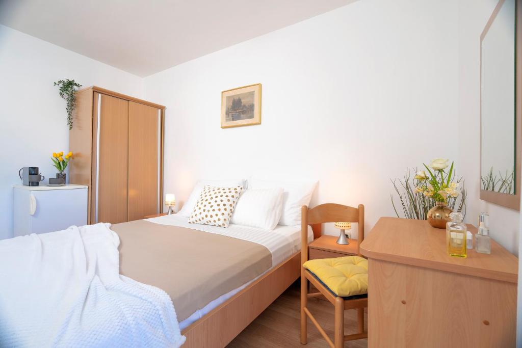 Postel nebo postele na pokoji v ubytování Novak Guesthouse - ZF Hvar