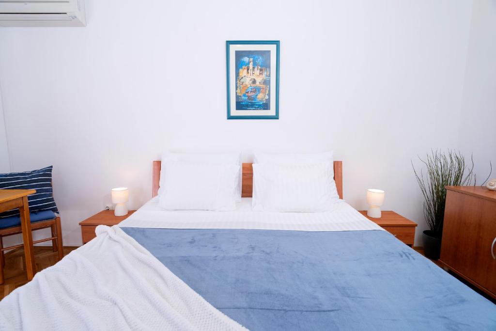 Postel nebo postele na pokoji v ubytování Novak Guesthouse - ZF Hvar