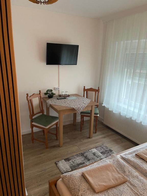 TV a/nebo společenská místnost v ubytování Airport Jazmin Guesthouse