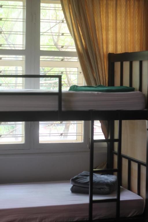 Postel nebo postele na pokoji v ubytování Villa Papillon
