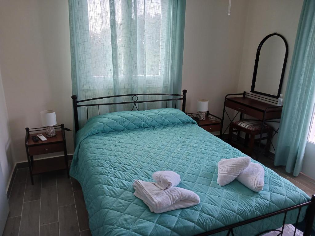 Postel nebo postele na pokoji v ubytování FIORE ROOMS