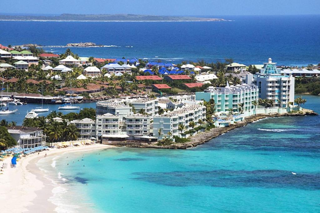 an aerial view of a resort on a beach at Oyster Bay Beach Resort in Dawn Beach