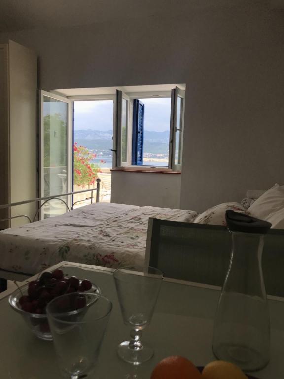 Posteľ alebo postele v izbe v ubytovaní Apartments Dunato Nedeljko
