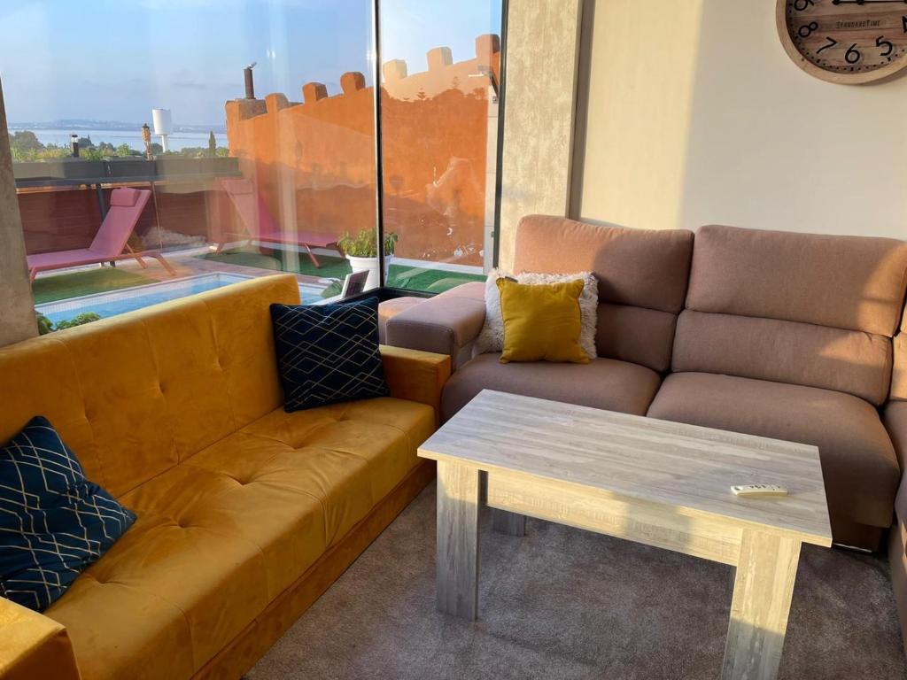 Posezení v ubytování Villa inaya