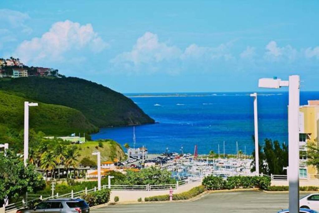 a parking lot with a view of the ocean at Pena Mar Ocean Club Best Views in Fajardo