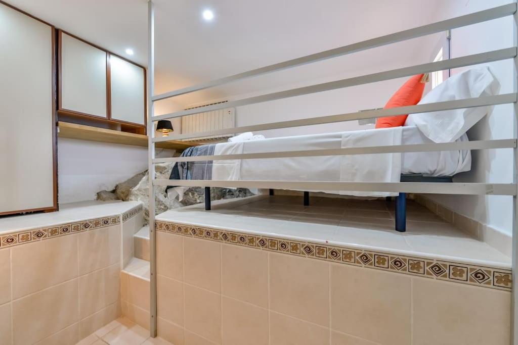 A bed or beds in a room at Villas Guzman - Tango