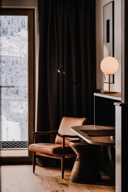 Posezení v ubytování The Comodo Bad Gastein, a Member of Design Hotels