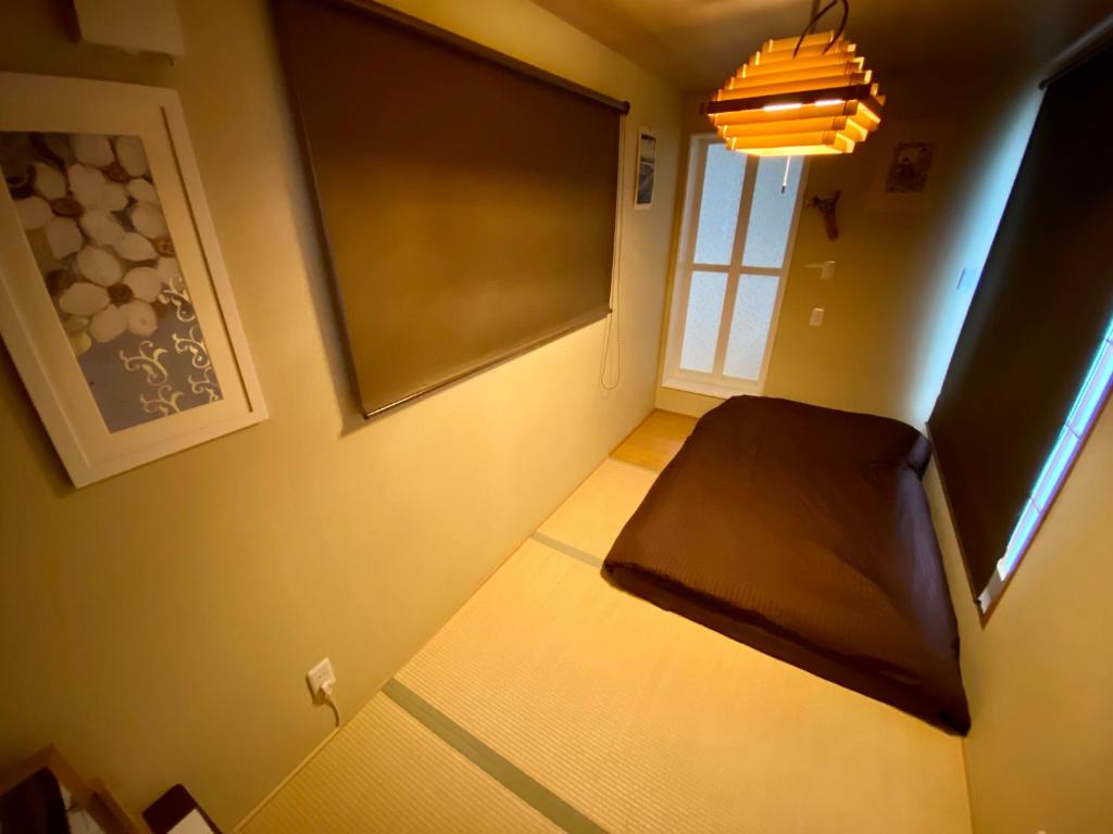 Postel nebo postele na pokoji v ubytování Hotel EL Shinjuku 6