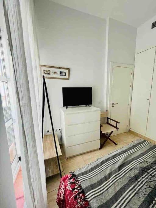 TV a/nebo společenská místnost v ubytování Apartamento Privado en Alameda de Hércules