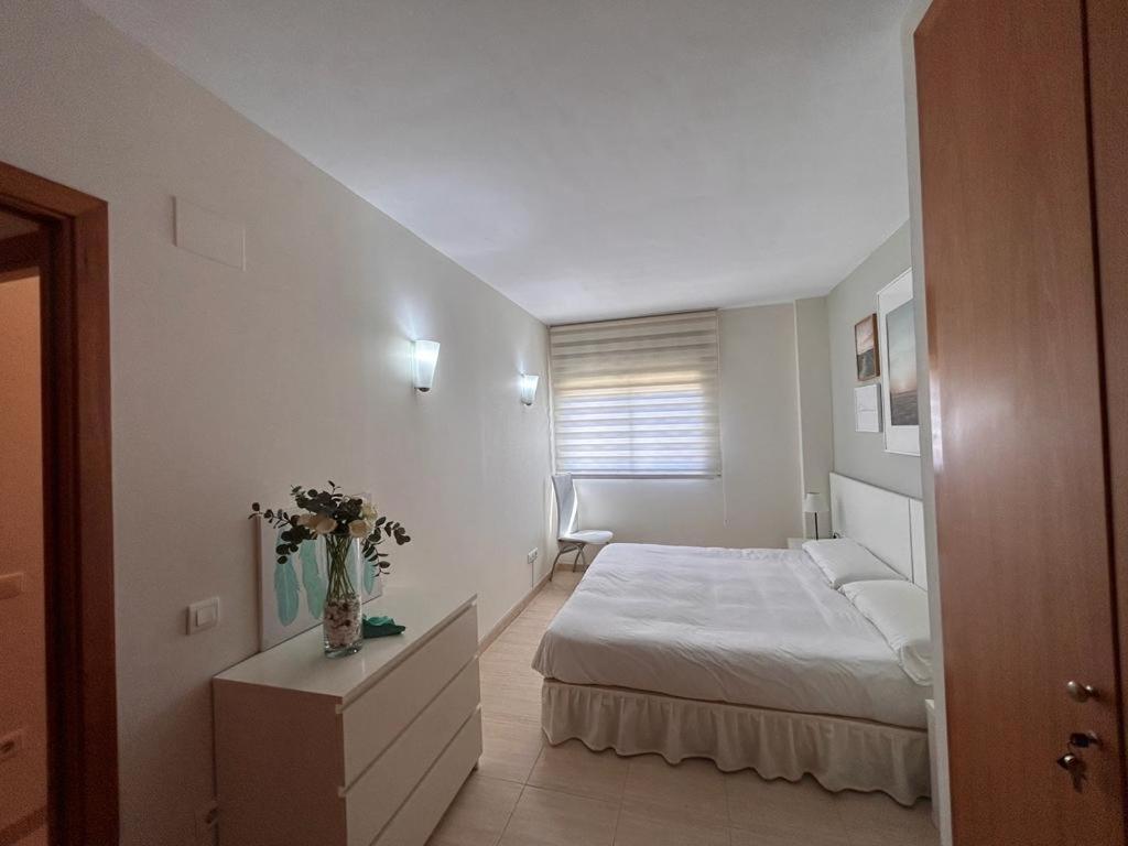 Postel nebo postele na pokoji v ubytování APARTAMENTO LOS GIRASOLES 1