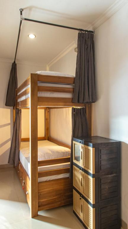 Postel nebo postele na pokoji v ubytování Zentiga Surf Hostel