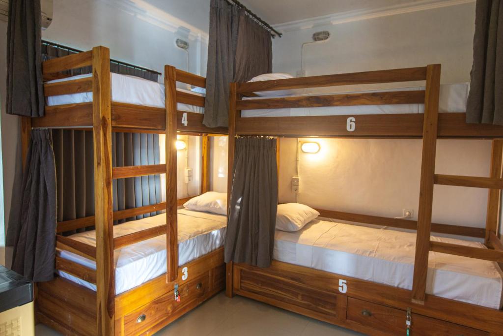 Postel nebo postele na pokoji v ubytování Zentiga Surf Hostel