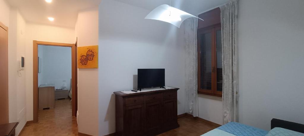 Televízia a/alebo spoločenská miestnosť v ubytovaní A casa di Mirco