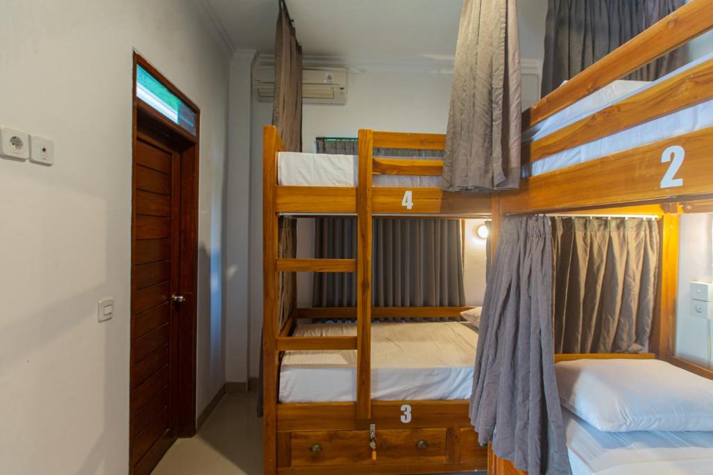 Postel nebo postele na pokoji v ubytování Zentiga Surf Hostel