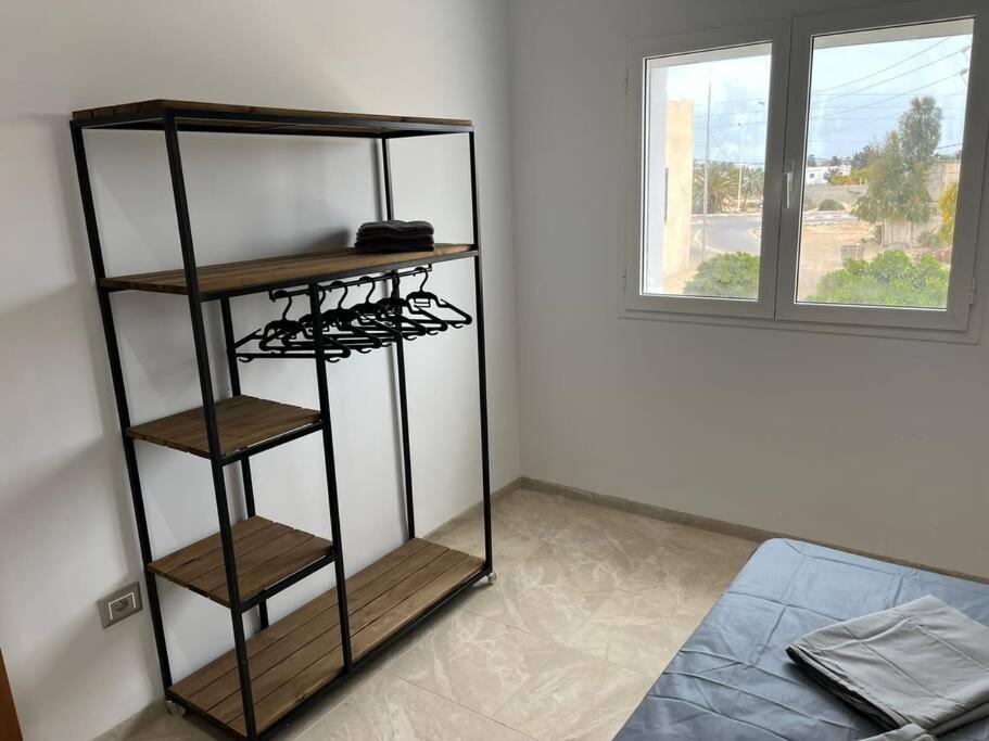 Postel nebo postele na pokoji v ubytování Studio Bleu Cosy à Dar Lili Djerba