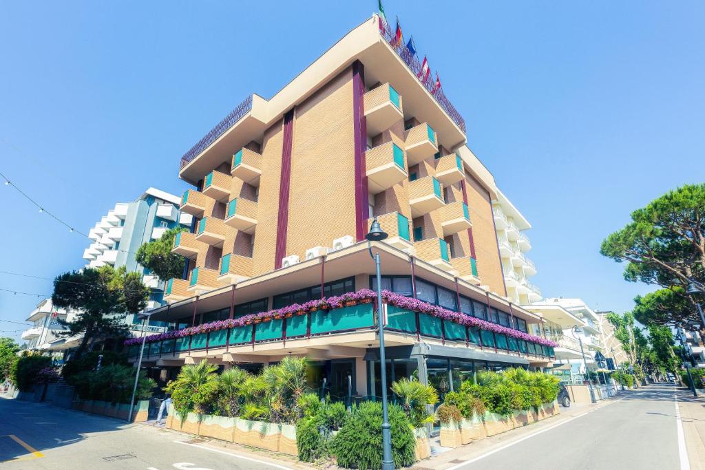 a tall building on the side of a street at Hotel Nevada in Bellaria-Igea Marina