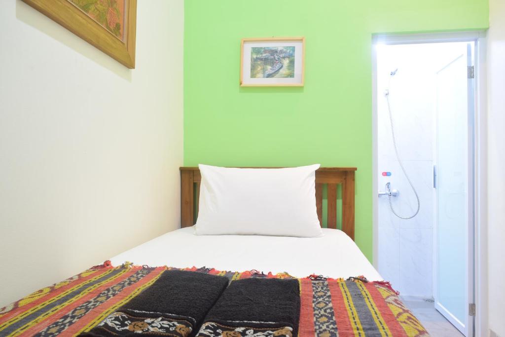 Postel nebo postele na pokoji v ubytování The Cabin Hotel Ambasador