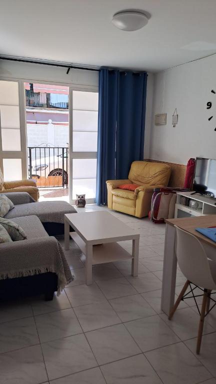 Posezení v ubytování CASA SANTO a 2 minutos de la playa a pié y parking gratuito