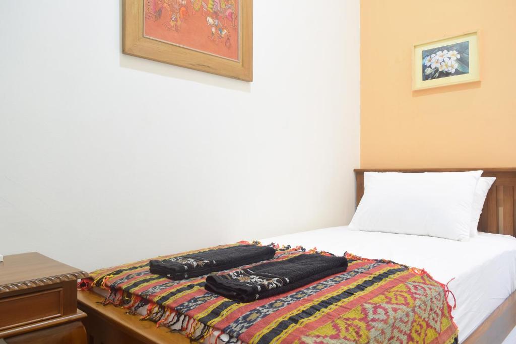 Postel nebo postele na pokoji v ubytování The Cabin Hotel Ambasador