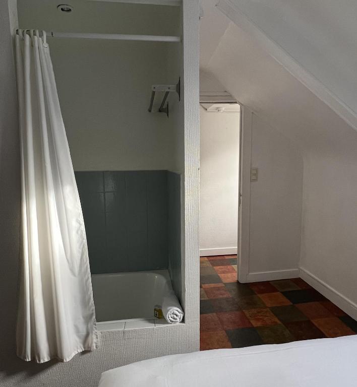 Posteľ alebo postele v izbe v ubytovaní HOTEL KAN AVEL