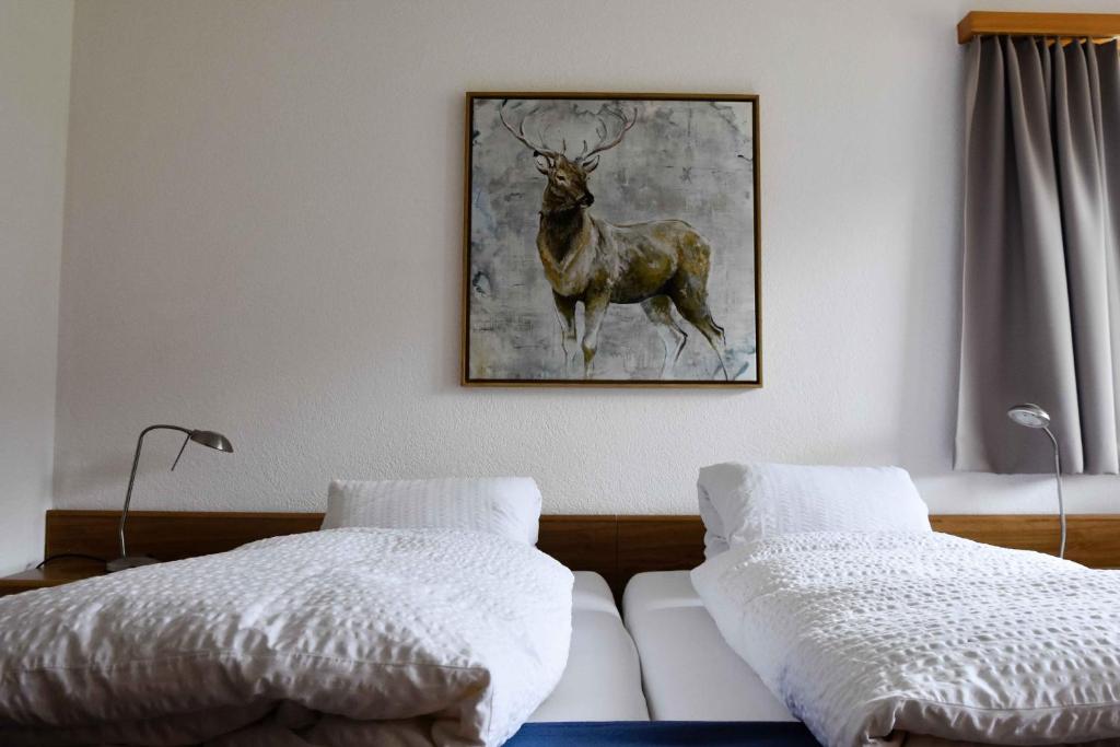 Cama o camas de una habitación en Hotel Pazzola