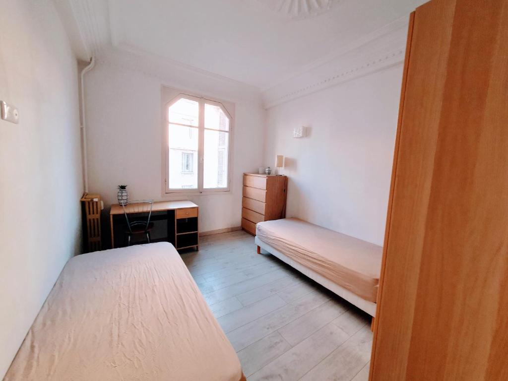 Postel nebo postele na pokoji v ubytování Climatisé,coeur de Juan-les-Pins