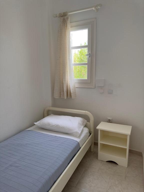 Postel nebo postele na pokoji v ubytování Kleanthi Apartments