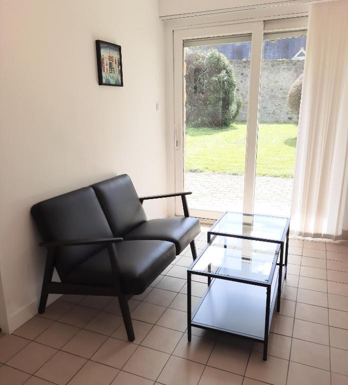Posedenie v ubytovaní Ty Cocoon- Appartement avec terrasse et parking privé