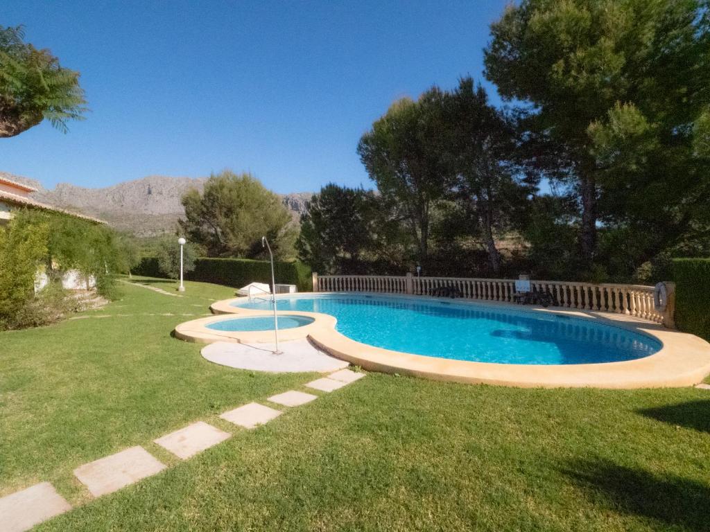 Swimmingpoolen hos eller tæt på HOUSE IN PRIVATE URBANIZATION