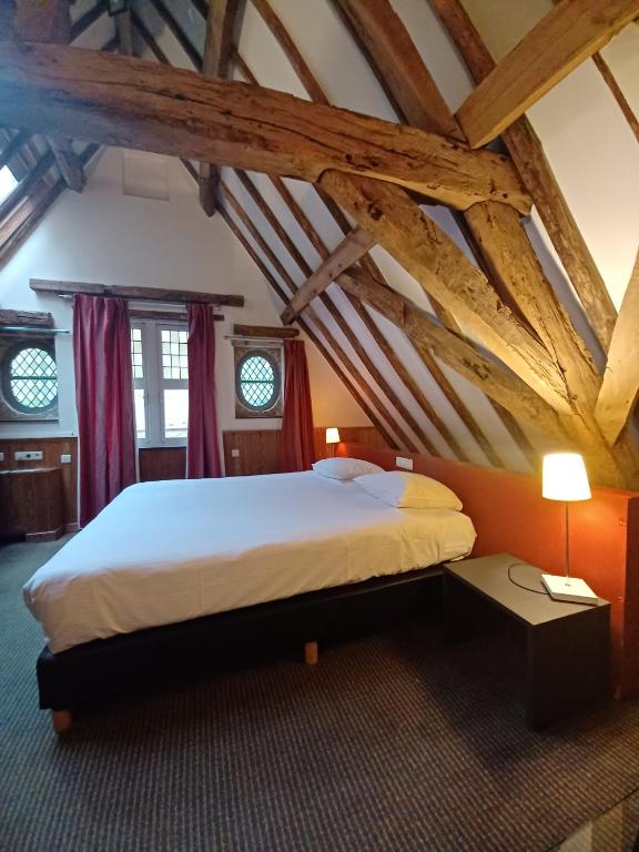 Postel nebo postele na pokoji v ubytování Hotel Koffieboontje