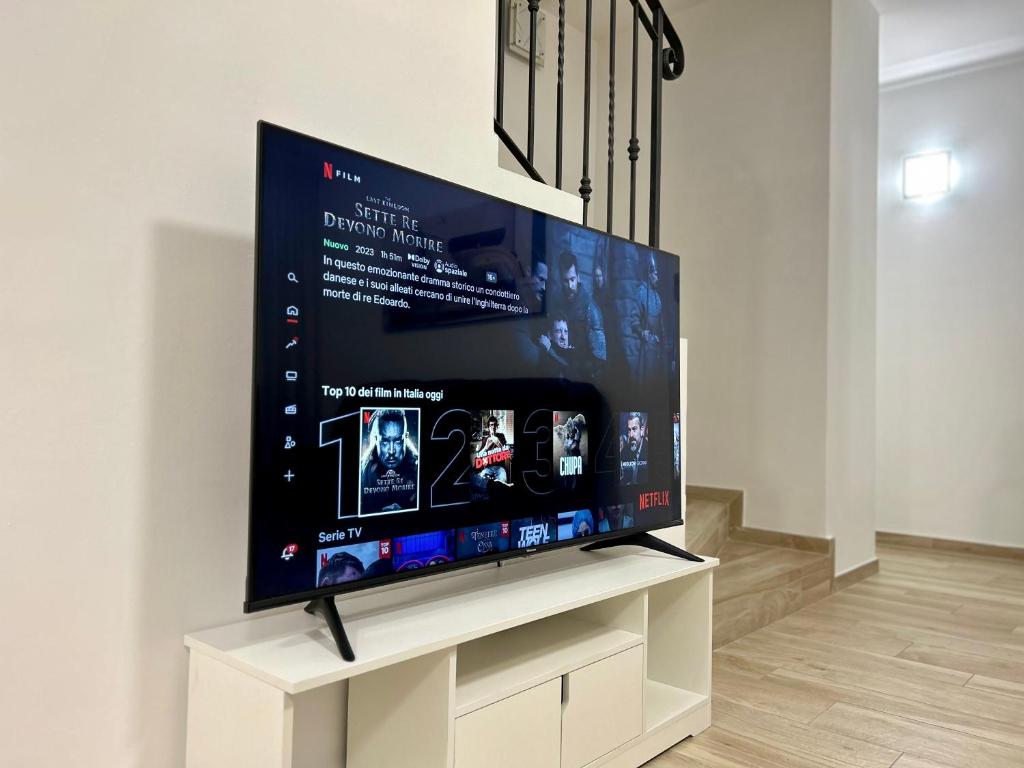 A television and/or entertainment centre at NEWHOUSE ROOFTOP - Super Penthouse Seaview