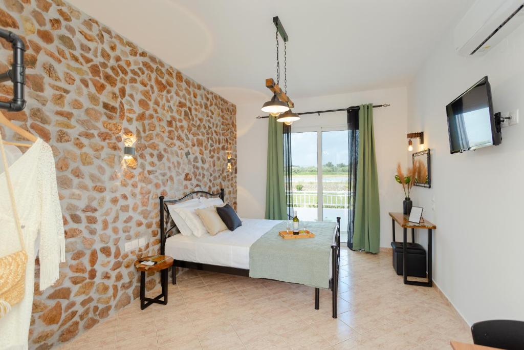 Postel nebo postele na pokoji v ubytování Althea Apartments
