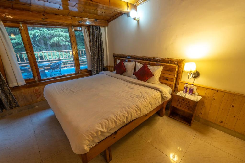 Postel nebo postele na pokoji v ubytování Holiday Home International -Vivaan Stays