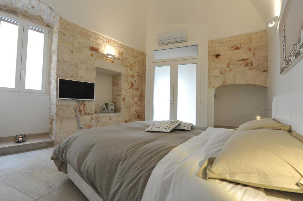 Postel nebo postele na pokoji v ubytování B&B Aurelia
