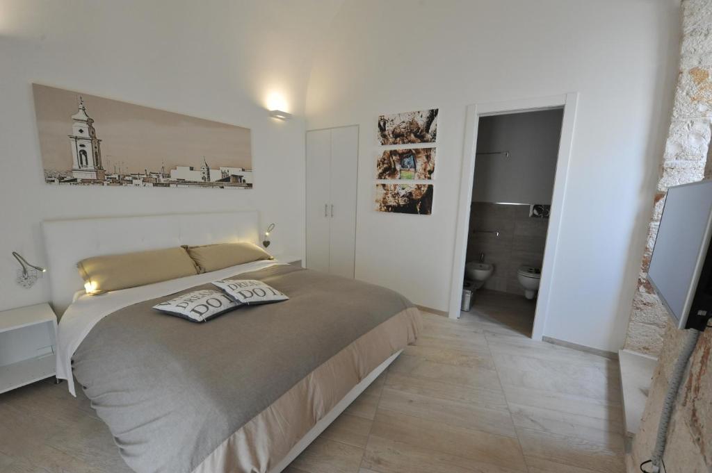 Postel nebo postele na pokoji v ubytování B&B Aurelia