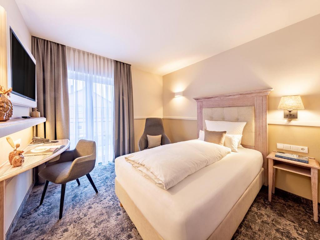 Postel nebo postele na pokoji v ubytování Landgasthof Hotel Gentner