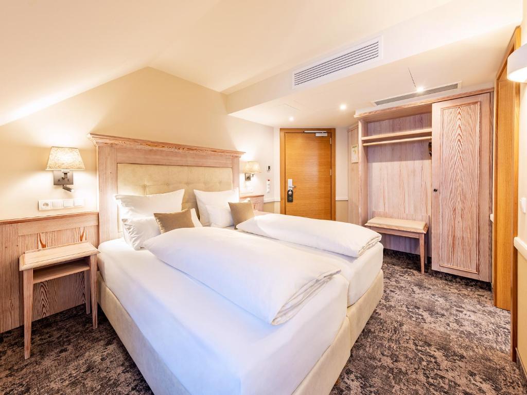 Postel nebo postele na pokoji v ubytování Landgasthof Hotel Gentner