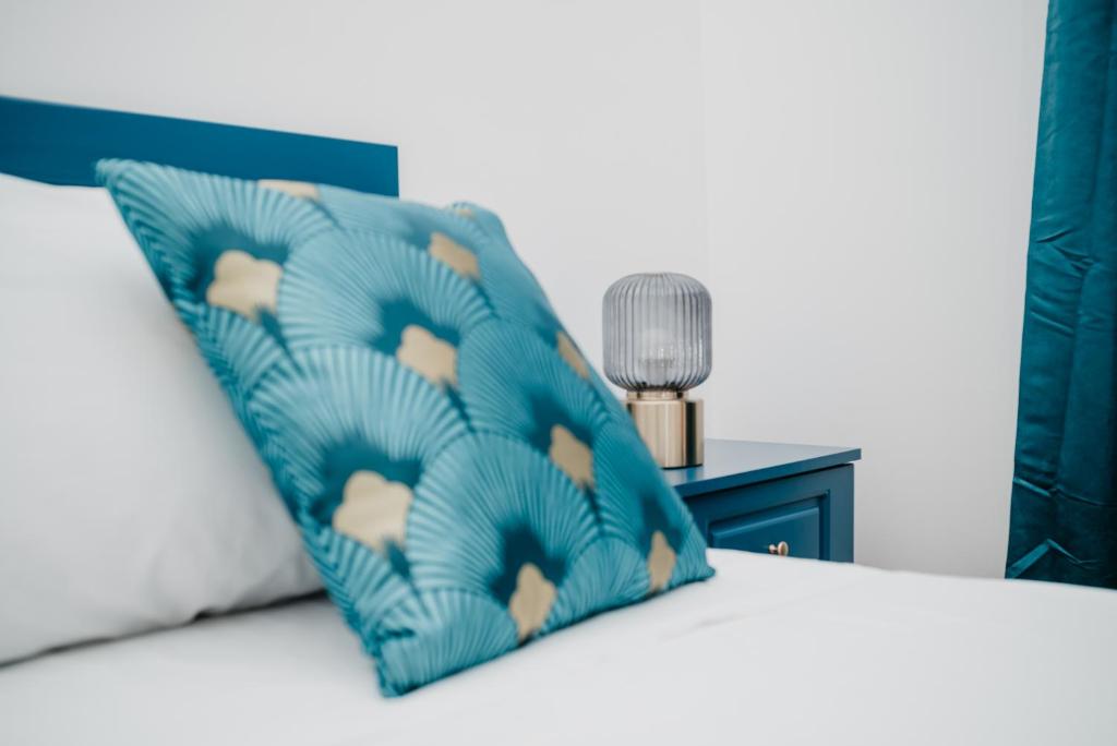 A bed or beds in a room at Vista Napoli Residence by Casa Napoletana