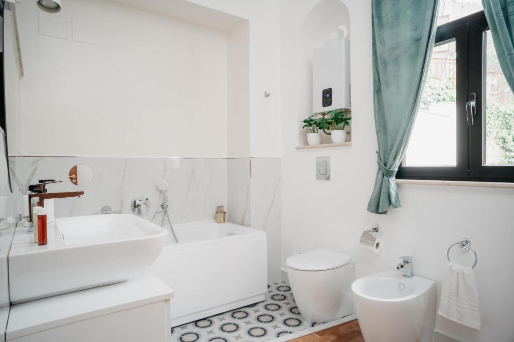 A bathroom at Vista Napoli Residence by Casa Napoletana