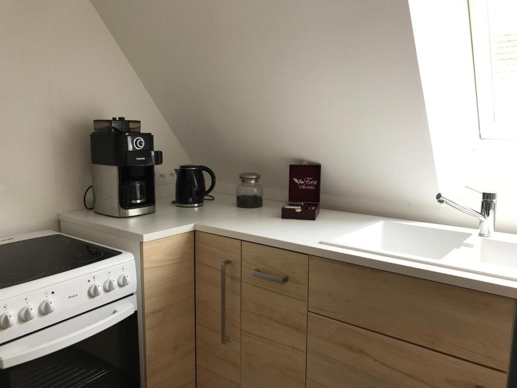 Kuchyň nebo kuchyňský kout v ubytování Tiers Lieu 59 Grand Rue