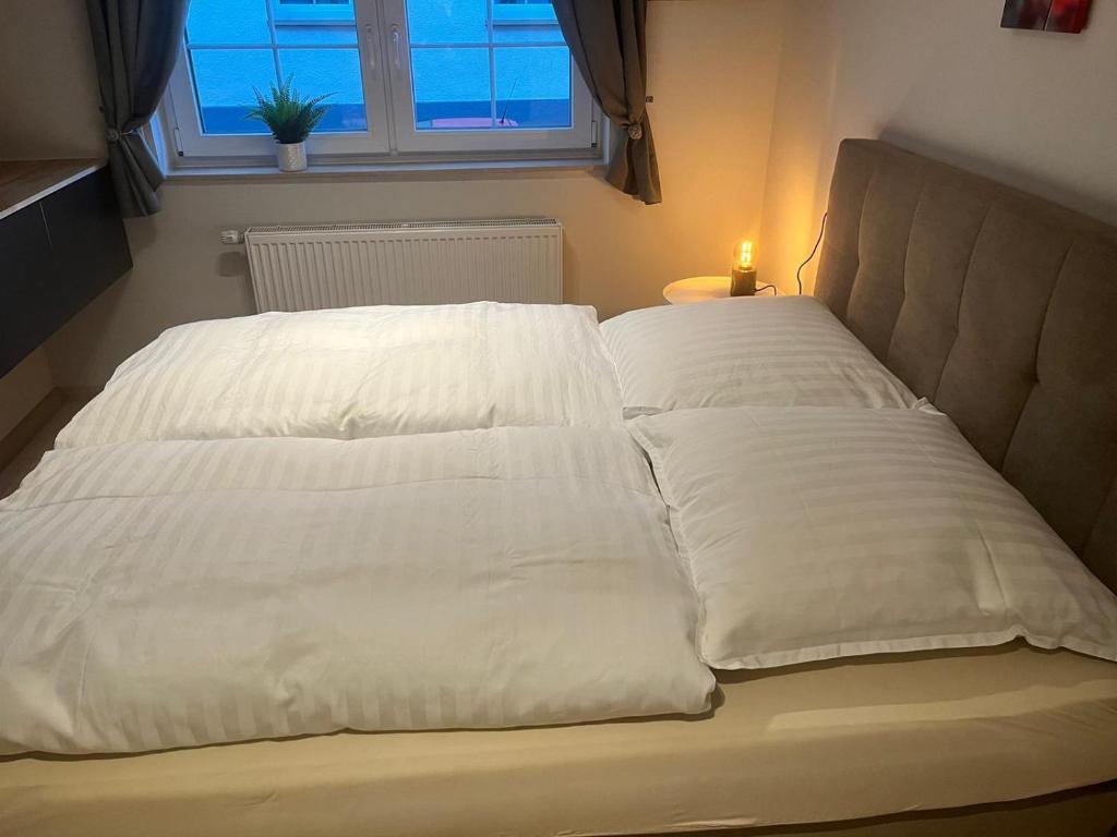 Postel nebo postele na pokoji v ubytování Apartmenthaus Wagner